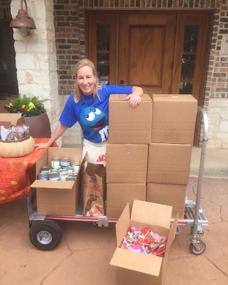 Dental team member collecting items for food drive