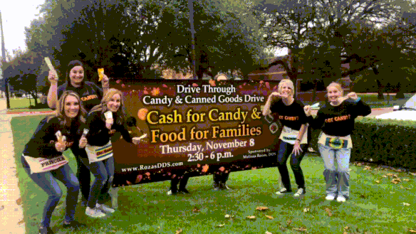 Team members at cash for candy event