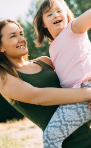 Mother and daughter smiling after special needs dentistry appointment