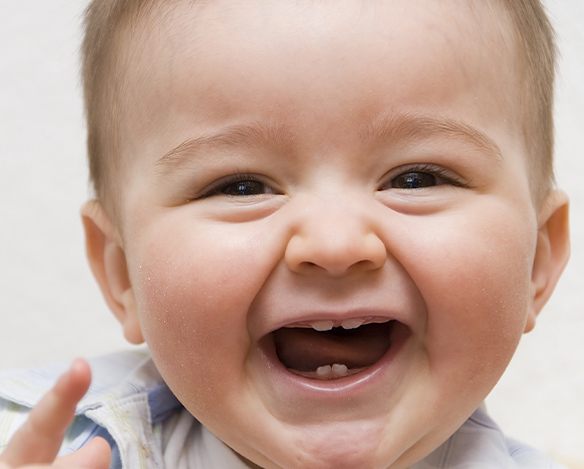Laughing child during infant oral health visit