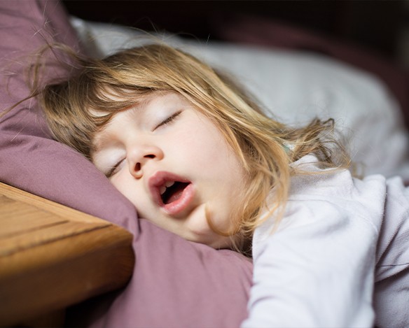 Child sleeping with mouth open