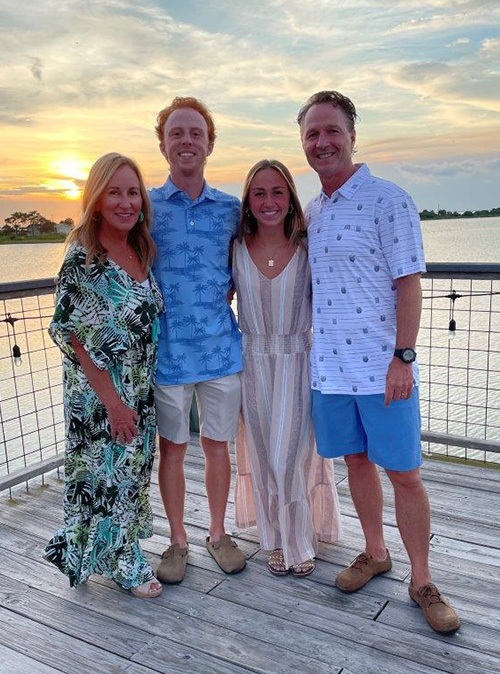 Doctor Rozas and family on a dock