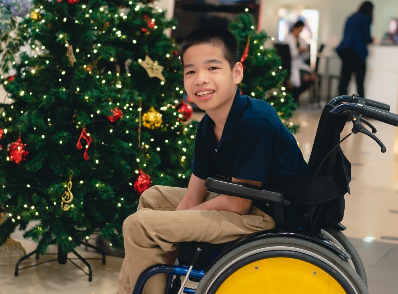 young boy in a wheelchair