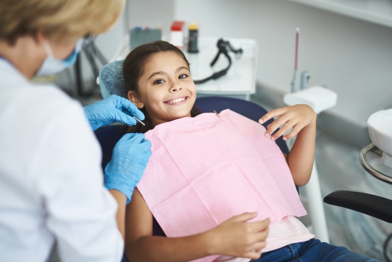 young girl visiting the dentist