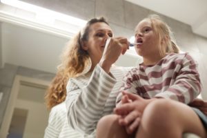 special needs child with toothbrush 