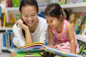 a parent reading to her child