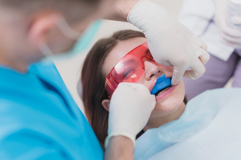 A child receiving a fluoride treatment