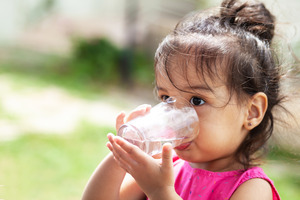 Child drinking from something